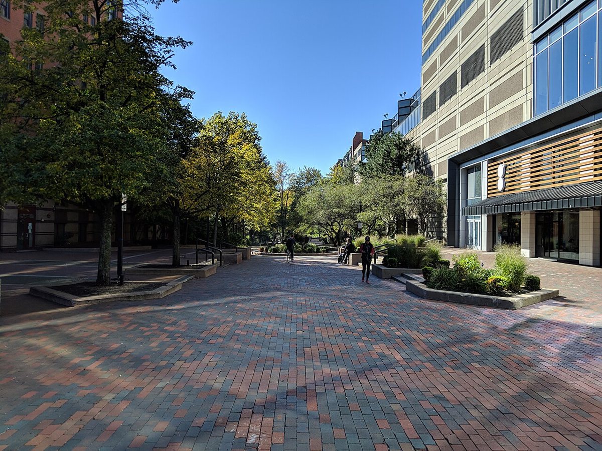 The brick promenade along Southwest Corridor Park in Boston